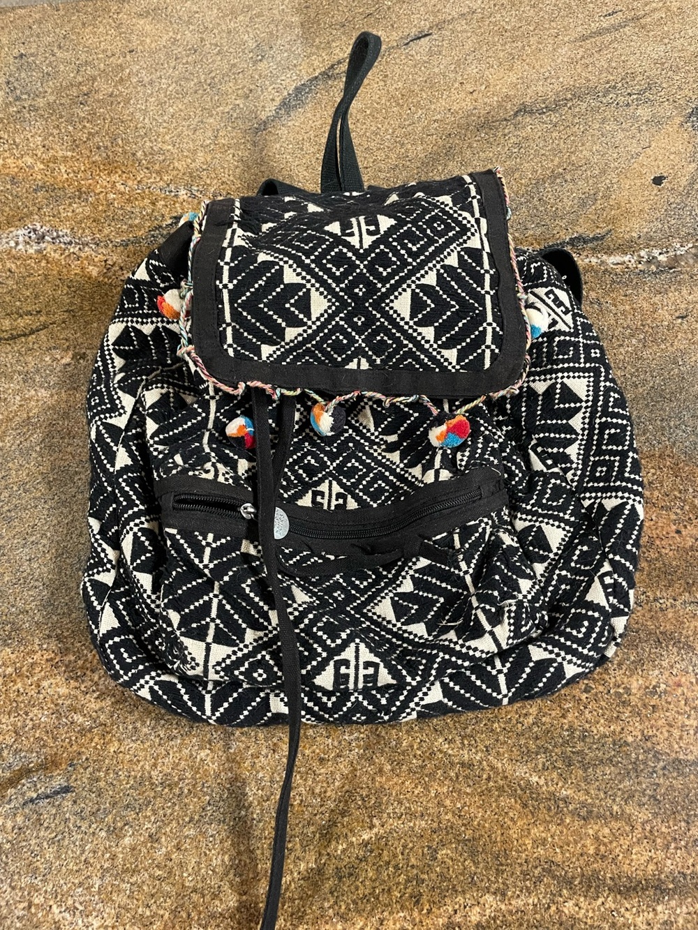 BOHO Draw String & Snap Closure Back Pack. Black & Off- White woven pattern.